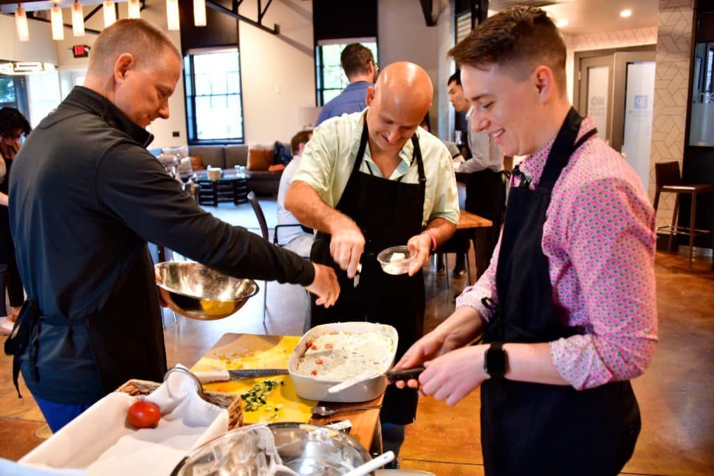A team cooking together in the open event space